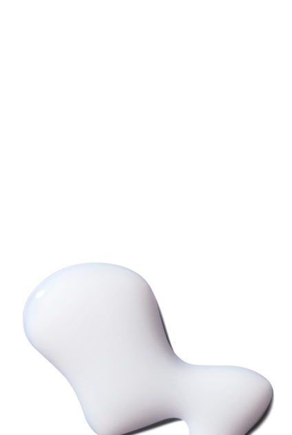 Primer plano de una textura cremosa blanca y rica, que ilustra un producto capilar nutritivo.