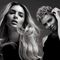 Three women with varying hairstyles pose against a dark background, showcasing stylish black outfits. Their expressions and hair create a dynamic, artistic composition.