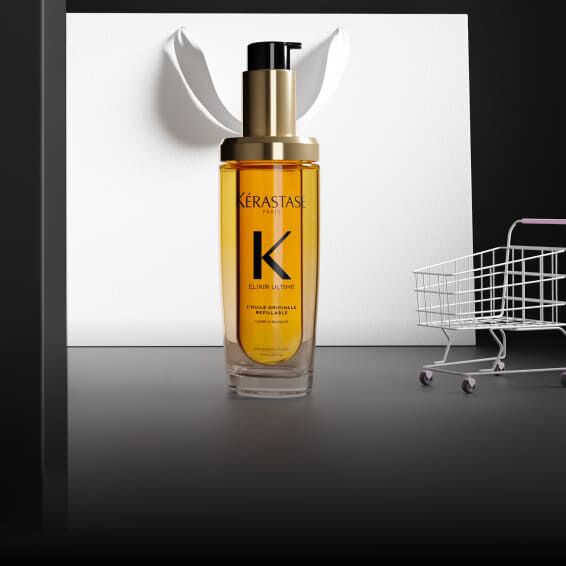 Frasco dorado del Aceite Original Elixir Ultime de Kerastase.