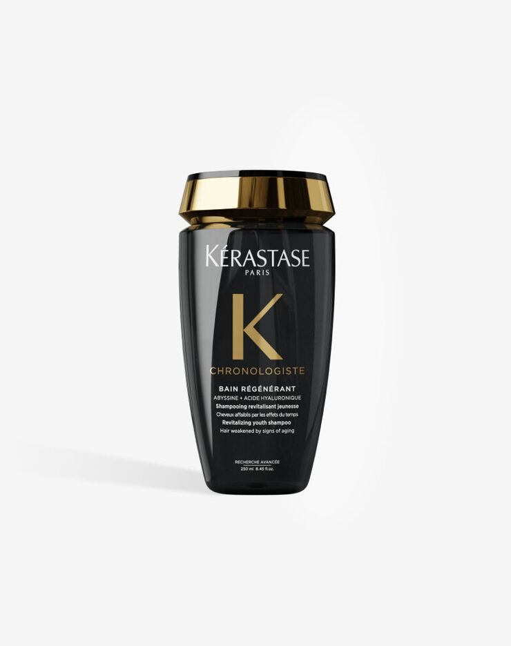Champu revitalizante Kerastase Chronologiste Bain Regenerant en una elegante botella negra con tapon dorado.