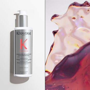 El concentre decalcifiant ultra-reparateur premiere Kerastase se coloca sobre una base. 