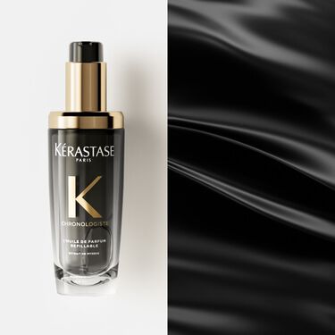 El huile Chronologiste Kerastase e appoggiato su un supporto bianco.