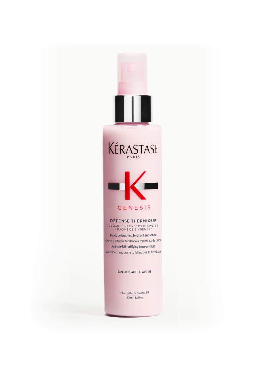 Botella rosa de Kerastase Genesis Defense Thermique, un protector termico capilar.