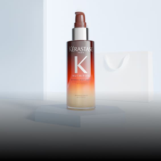Frasco naranja del Serum Noche 8H Nutritive de Kerastase.