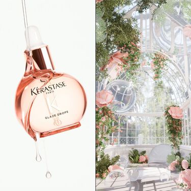 El frasco de Glaze Drops Gloss Absolu suspendido en el aire con un jardin de rosas.