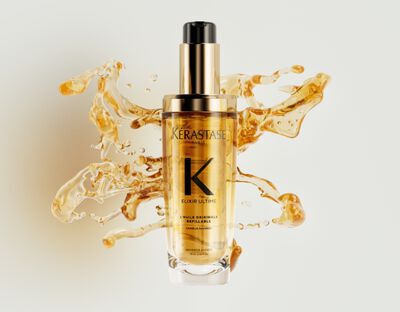 El nuevo Elixir Ultime recargable esta decorado con preciosas gotas de aceite capilar doradas y texturizadas.