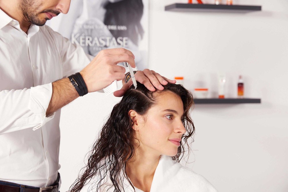 Kerastase’s Professional Hairdresser representative, Hovig – washing client’s hair with Nutritive product